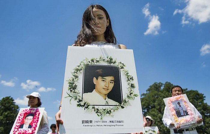 Marcia a Washington Dc in ricordo delle vittime della persecuzione per mano del Pcc ( JIM WATSON/AFP/Getty Images)