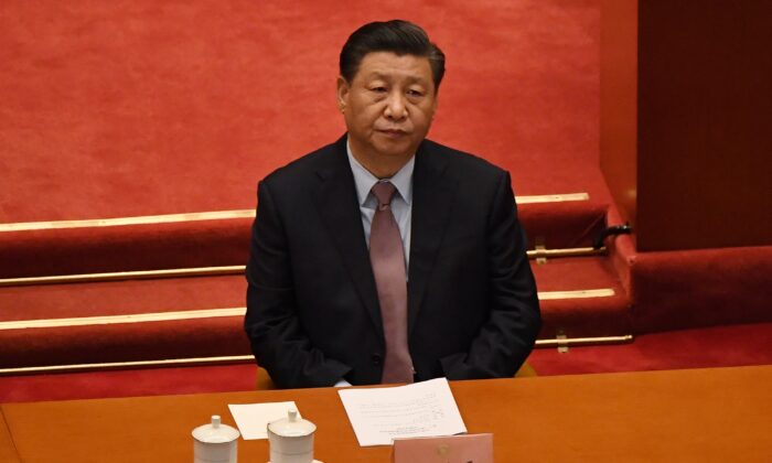 Il leader cinese Xi Jinping partecipa alla cerimonia di apertura della Conferenza consultiva politica del popolo cinese (Cppcc) presso la Grande Sala del popolo di Pechino, in Cina, il 4 marzo 2021 (Leo Ramirez / AFP via Getty Images)