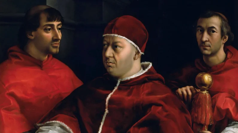 Particolare del ritratto di Leone X con i cardinali Luigi de' Rossi e Giulio de' Medici, 1518, di Raffaello. Olio su tavola. Galleria degli Uffizi, Firenze. Pubblico dominio