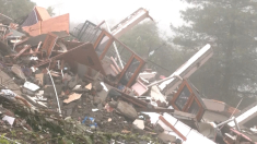 Frana causata dalla pioggia provoca il crollo di un edificio in India